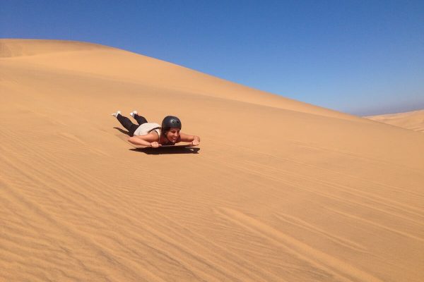 Dune climbing and sand-boarding, Namibia: